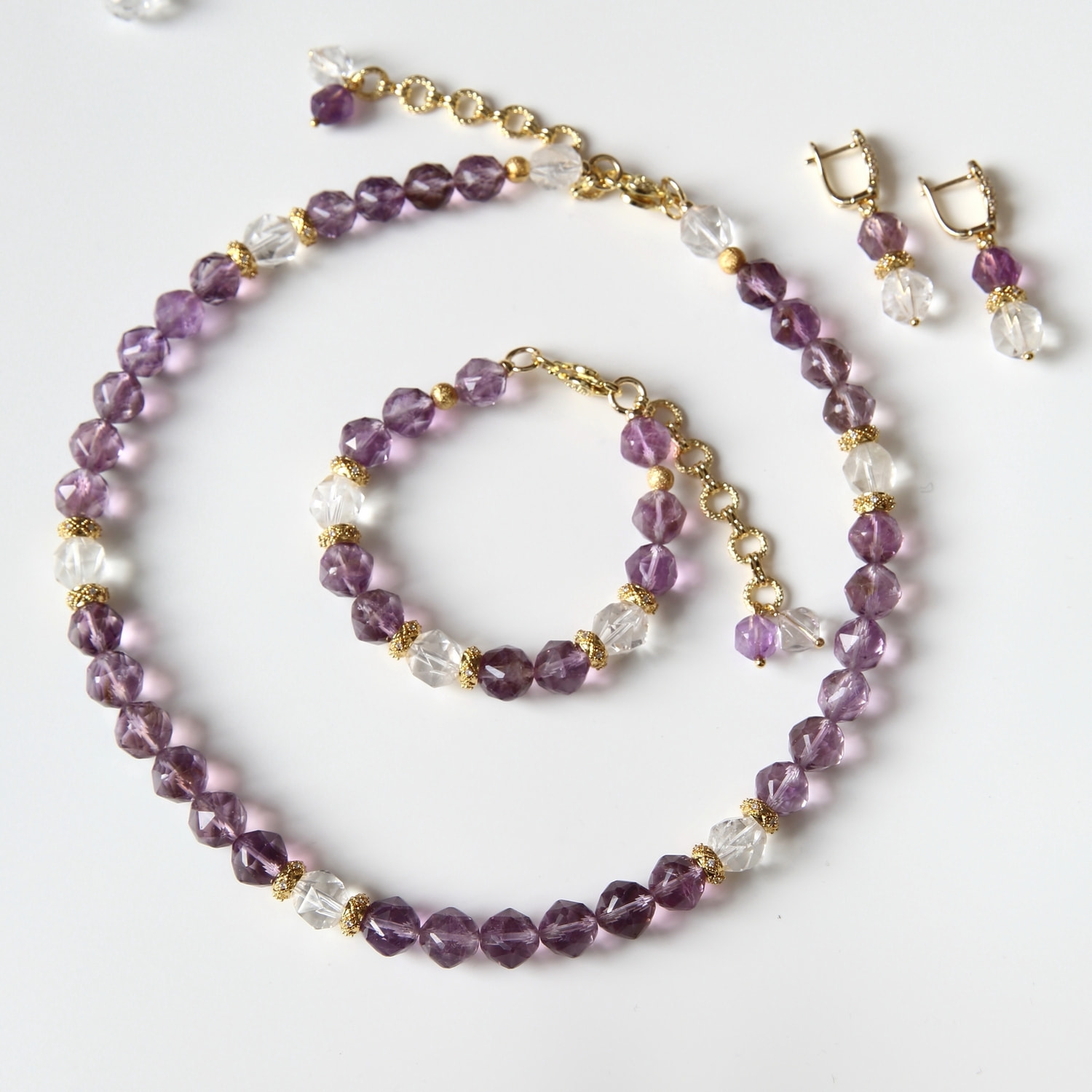 Комплект украшений из аметрина и горного хрусталя (вид 1) Комплект украшений из аметрина и горного хрусталя (фото, вид 1)