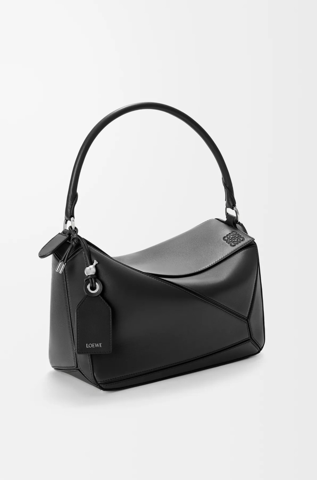 ����� ������� �� ����������� ���� Loewe Puzzle Featherlight (����, ��� 8)